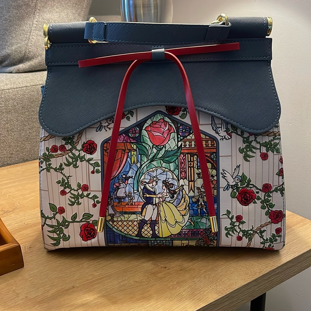 Loungefly Beauty and the Beast crossbody handbag.